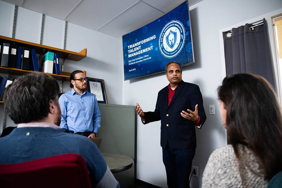 Photo of UNT professor Ram Dantu and student researchers 