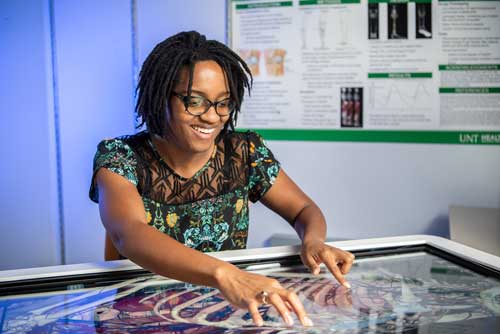 student with Anatomage table