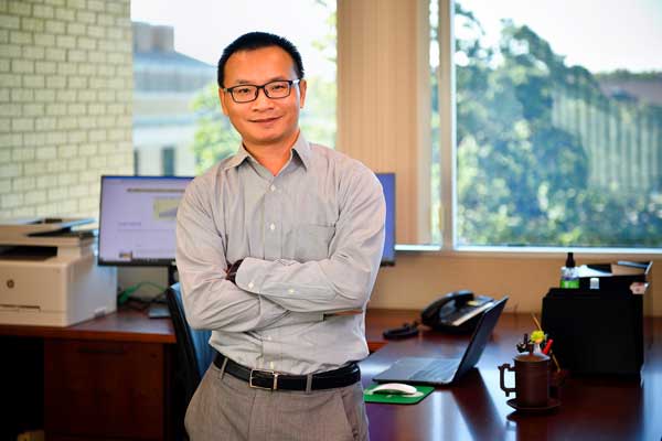 Shengqian Ma in his office Shengqian Ma in his office