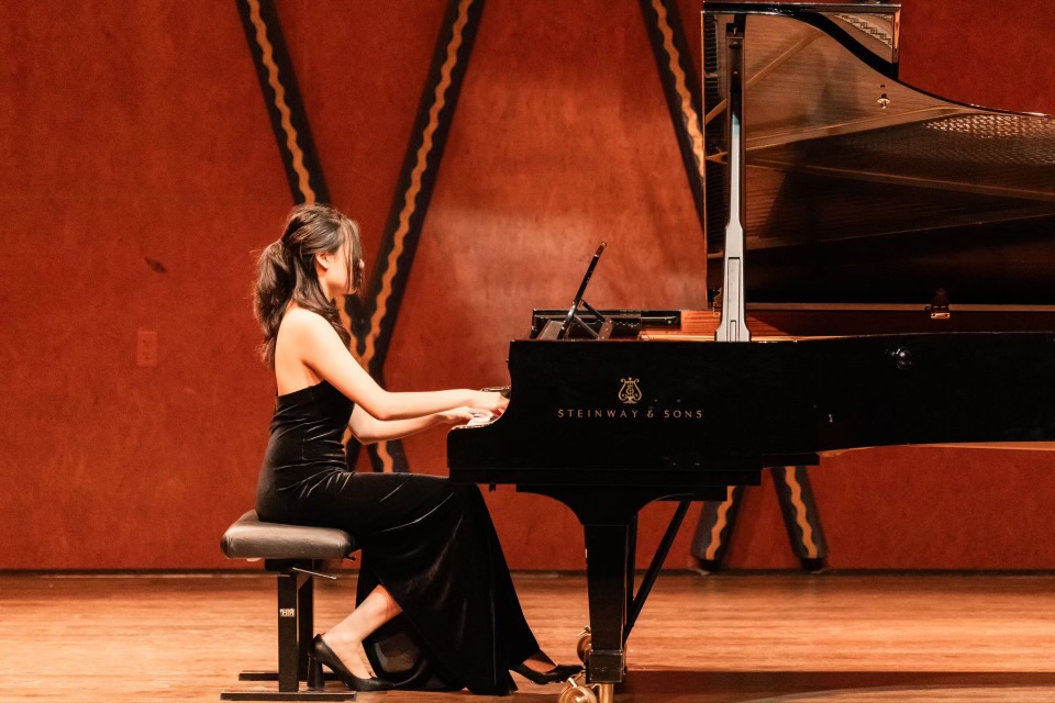 Student playing piano