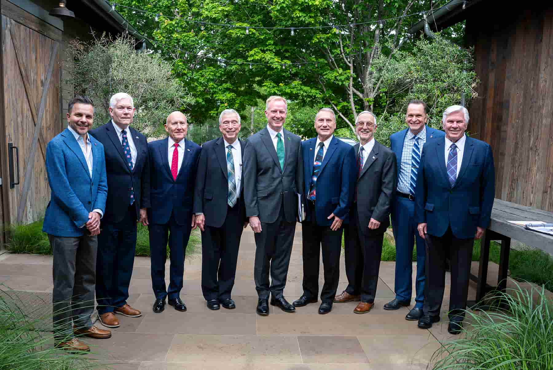 nine men gathered 