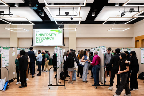 Crowd of people at Poster Session.