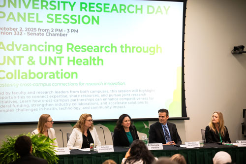 Panelists speak during the afternoon panel session.