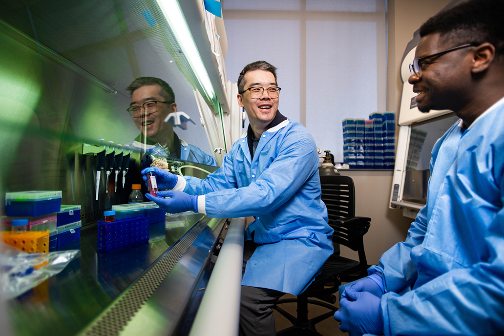 UNT associate professor Adam Yang and student Joel Aboagye conduct research in the lab.