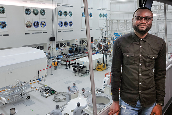 Photo of UNT alumnus John Femi-Oyetoro at a NASA facility 
