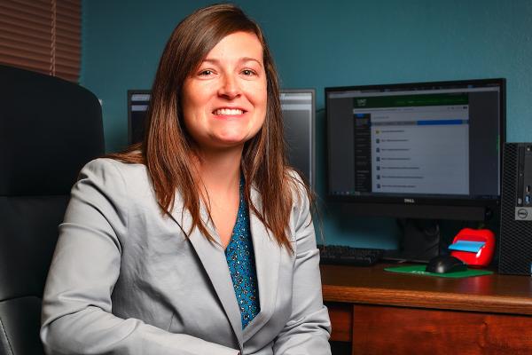 Dr. Lauren Eutsler at desk