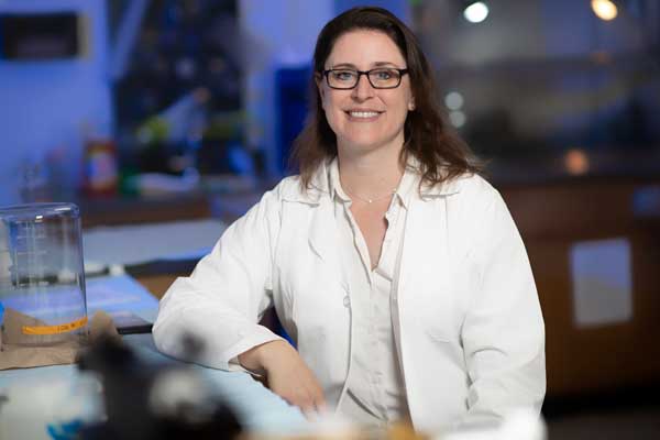 Dr. April Becker in labcoat