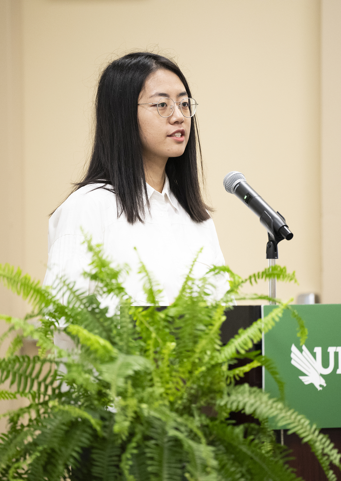 Photo of doctoral student Liyu Yang presenting at University Research Day