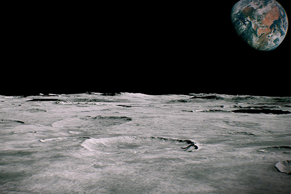 Stock photo of surface of the moon with Earth in the background