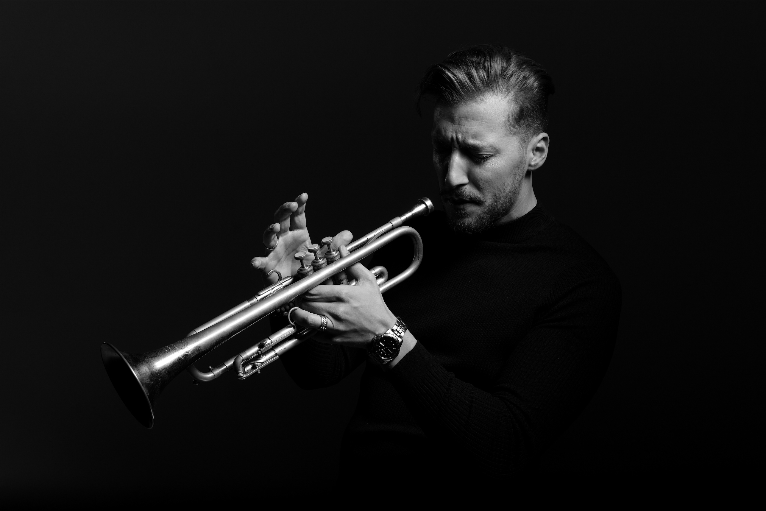 Photo of Philip Dizack playing the trumpet 